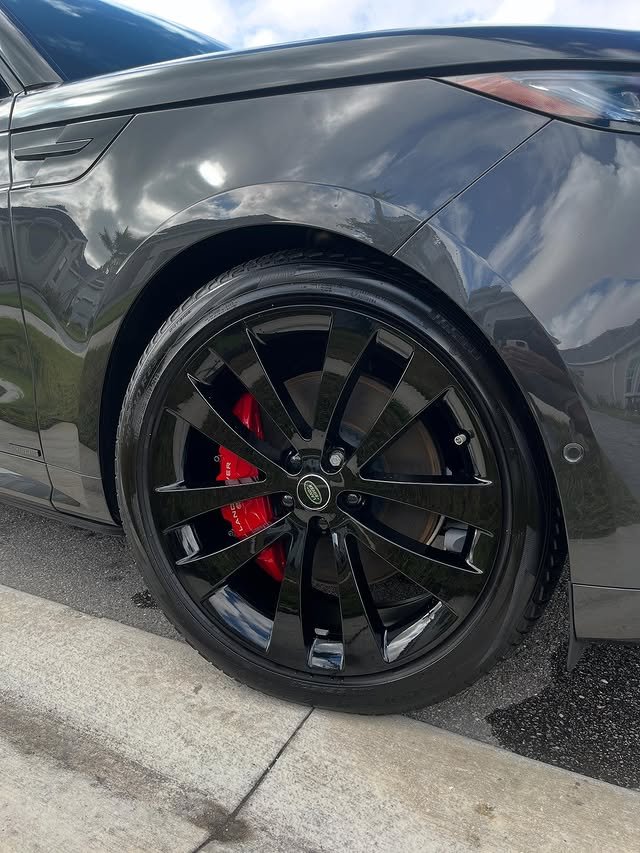 Close-up shot of Range Rover wheels after detailing
