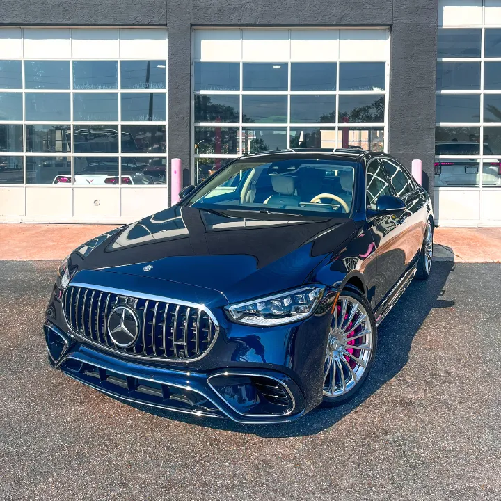 Restored shine on car detailed Mercedes outside shop